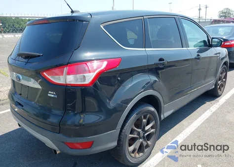 2013 Ford Escape Sel z USA, uszkodzony, nr VIN 1FMCU9H98DUD41603